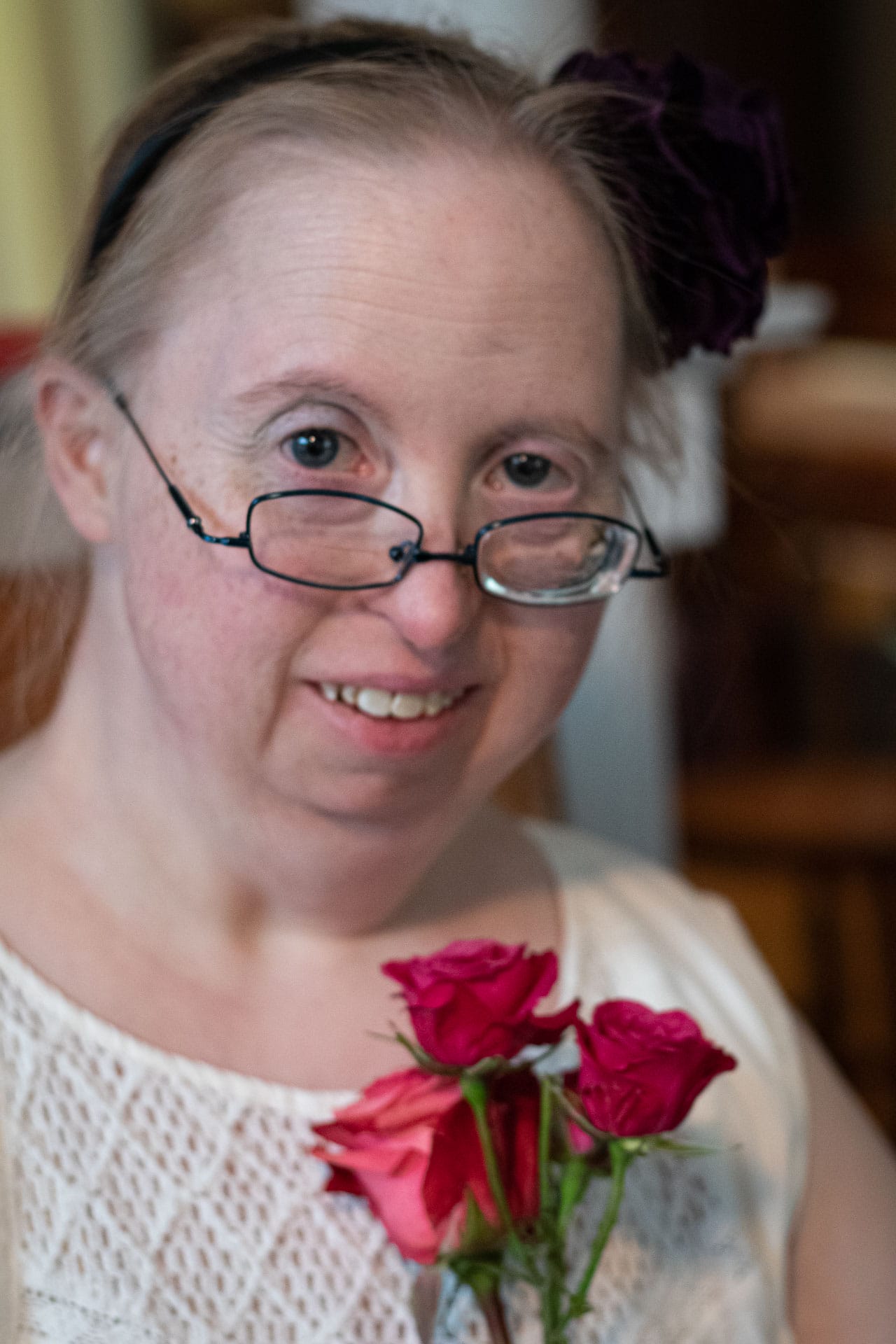 Sharon in white dress with pink roses