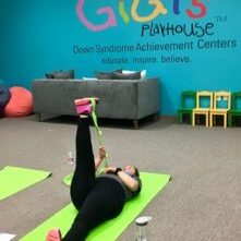 Alicia stretching using the GiGiFIT band.