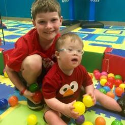 Thomas Pinkham and Sam Thomas and Samuel in the ball pit! Sam's favorite spot!