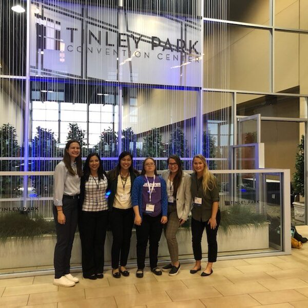 Emily posing with her co-presenters and Thursday night program leaders (from the right): Sydney W., Amanda P., Paulina P., Emily K., Jenny P., and Lisa L.
