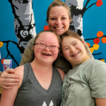 Tonya Thompson spending time at the Playhouse with GiGiFIT participants Cora and Staci. 