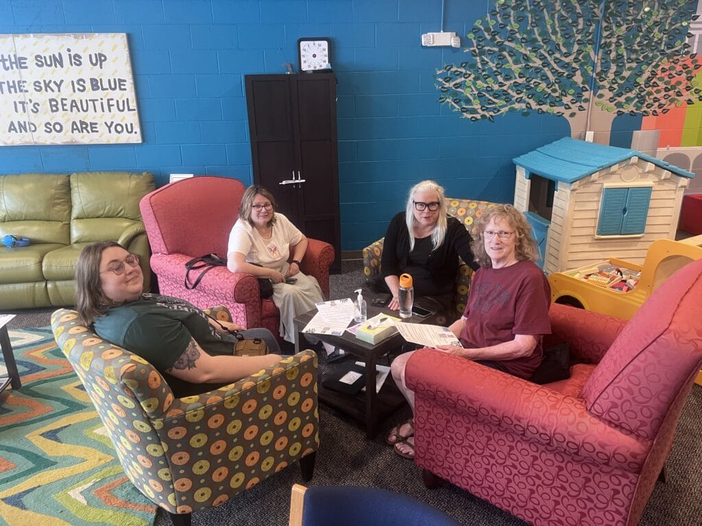 Adult women sitting together in GiGi's Playhouse
