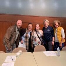 Group of GiGi's Playhouse Madison families after presenting at Day with the Experts Down Syndrome