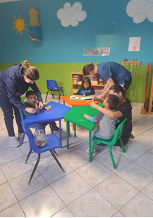 Indoor activity staff with kids