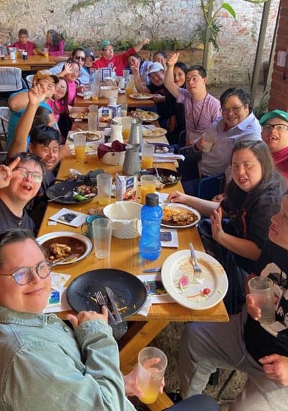 Group of people eating over the table