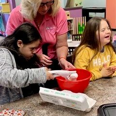 Aniya, Marlene &amp; Chloe cracking eggs