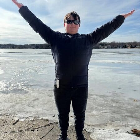 Ryan is a teen with Down syndrome, shown here on a beach vacation.