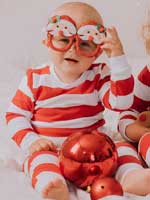 children-in-red-and-white-pajamas-try-on-funny-gla-2022-11-14-12-01-47-utc