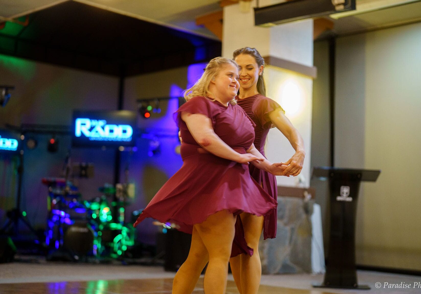 Two young ladies dancing