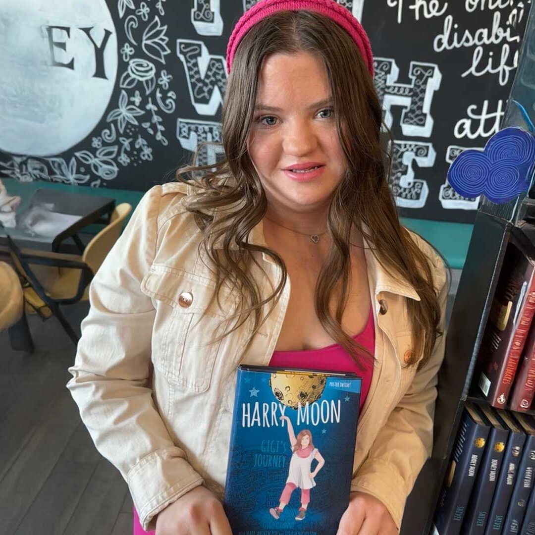 gigi holding harry moon book