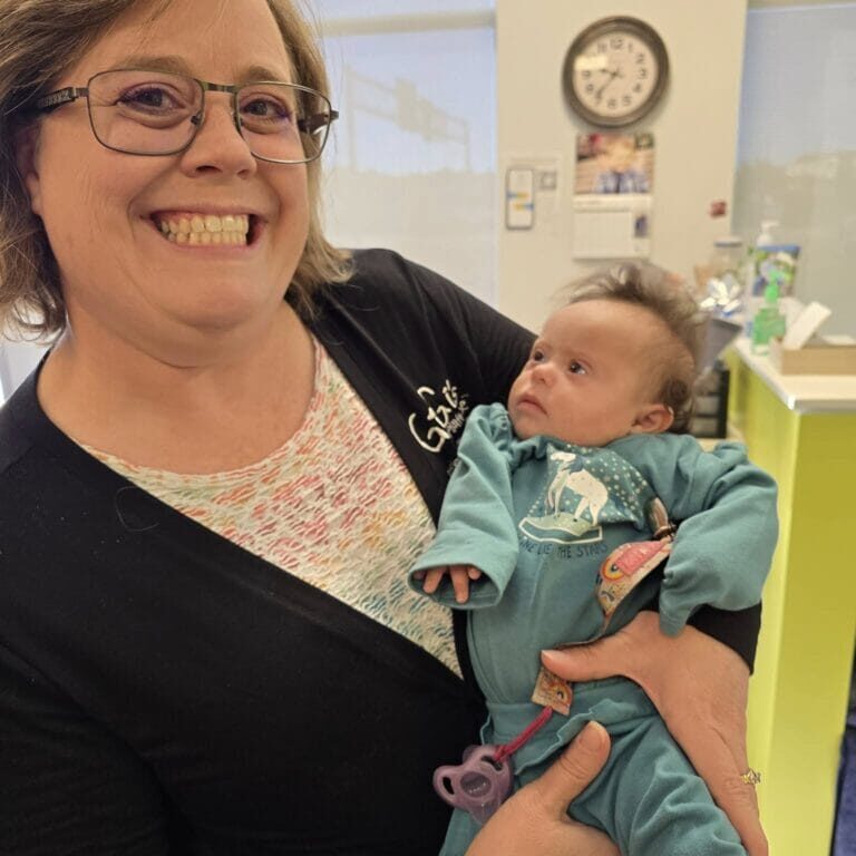 GiGi's Playhouse Quad Cities Site Director welcoming a new baby to the Playhouse