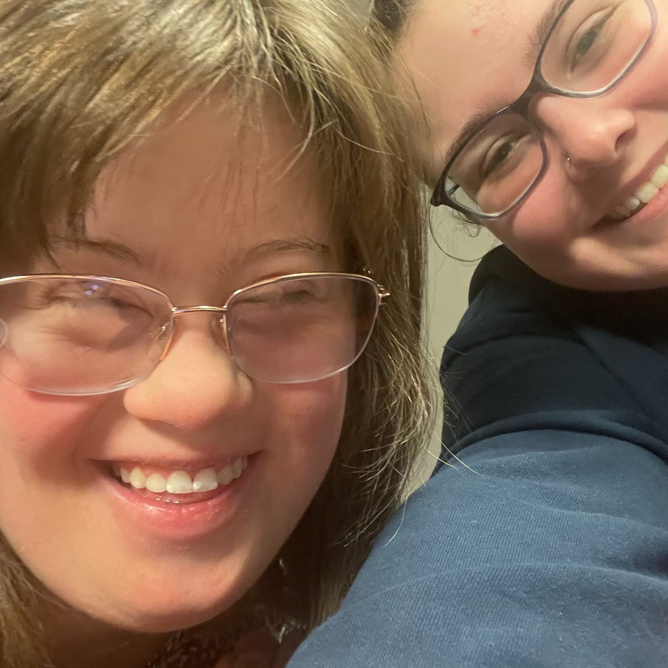 Volunteer and participant smiling at the camera