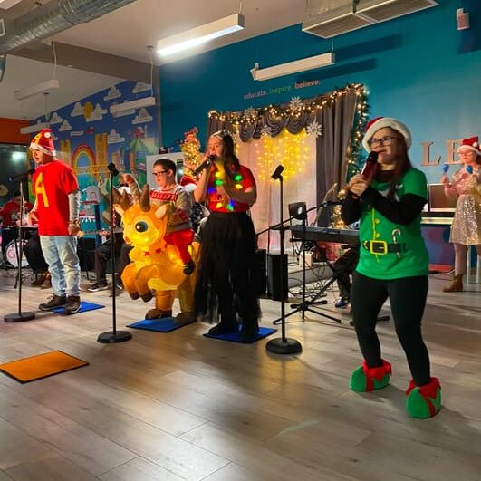 Rock rules class performs at the holiday concert