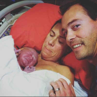 new born with Down syndrome, mom and dad.