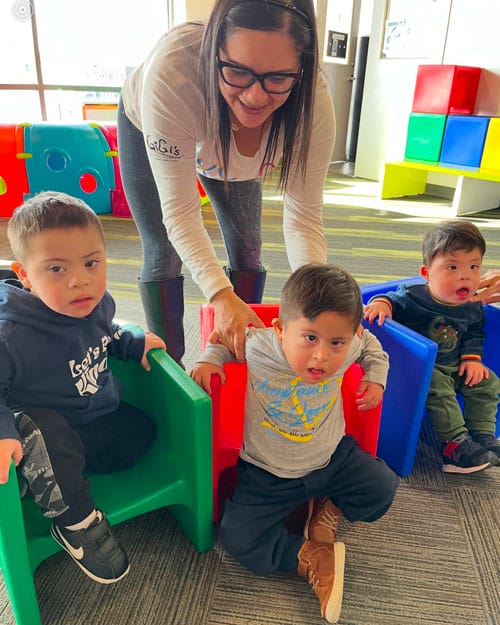 Boys with down syndrome attending a class