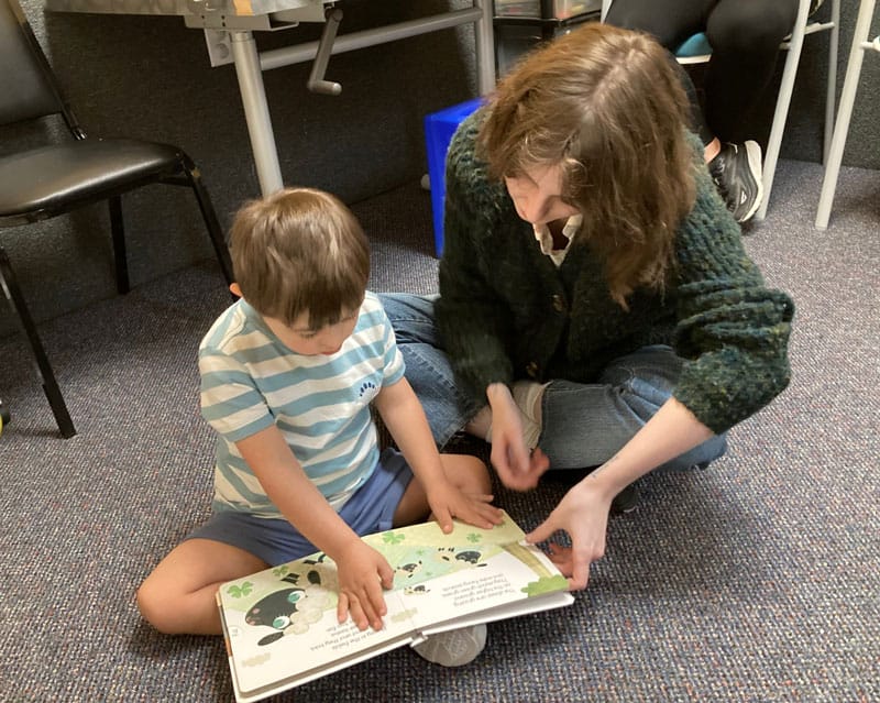 boy learning to read