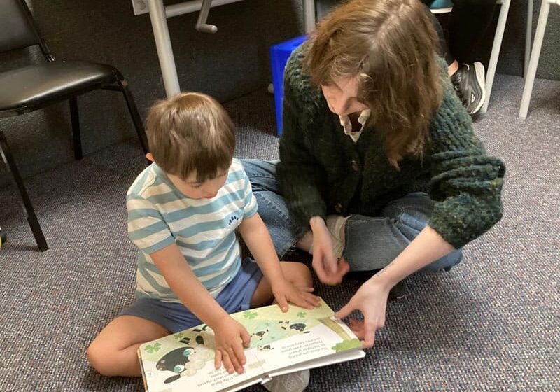 boy learning to read