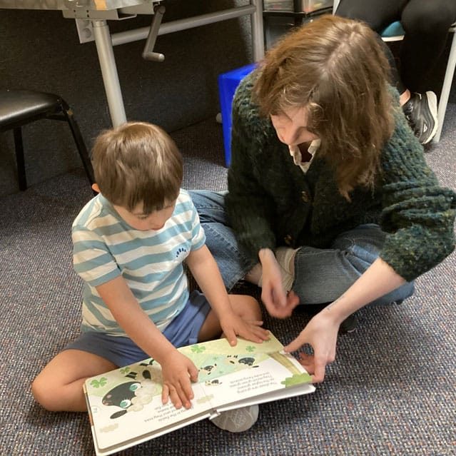 boy learning to read